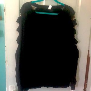 Sunshine & Rodeos large long sleeve top with ripped leopard sleeves